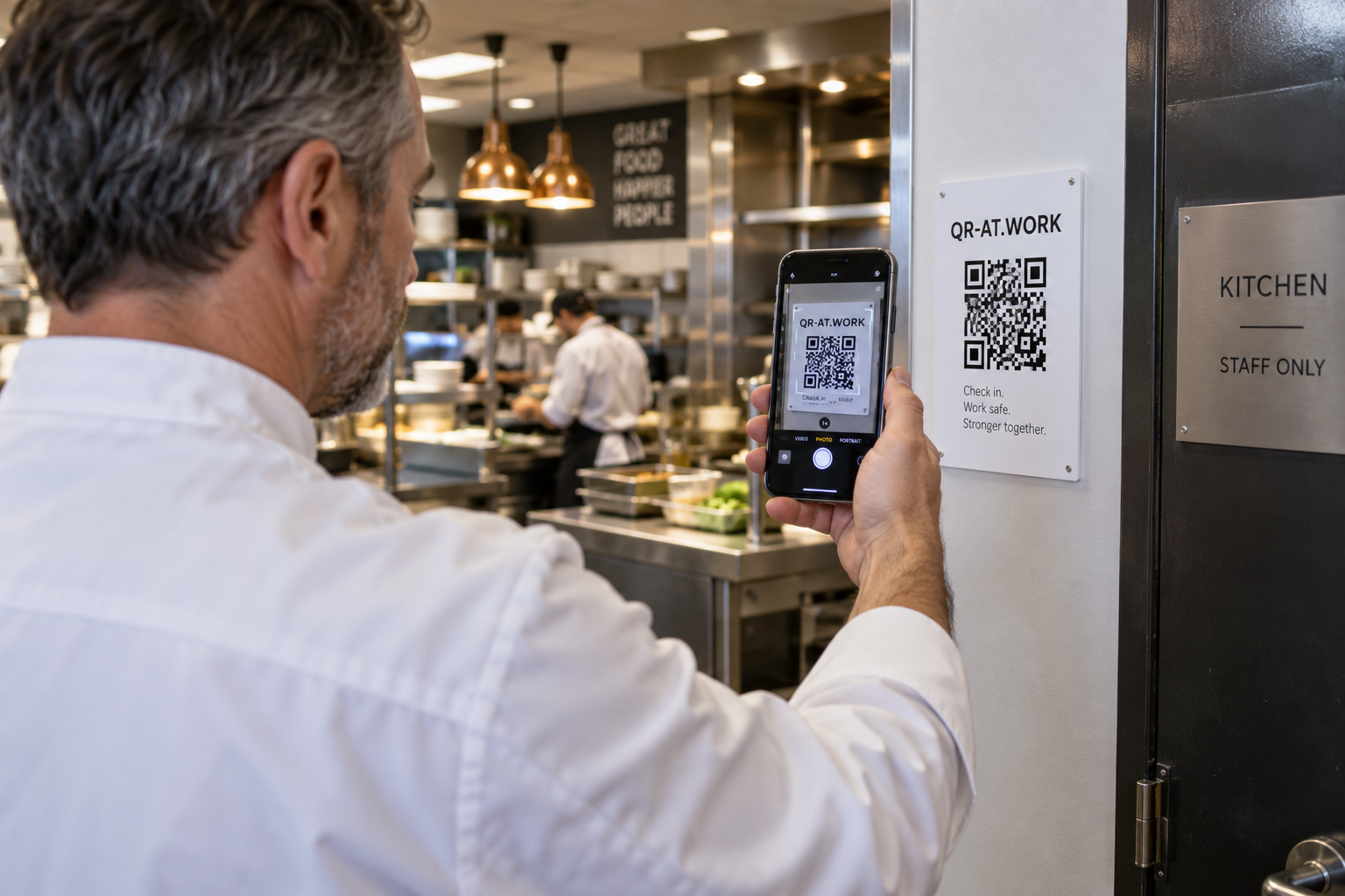 A chef scans at the kitchen entrance.
